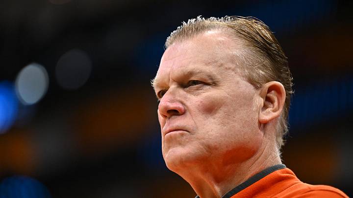 Mar 28, 2026; Houston, TX, USA; Illinois Fighting Illini head coach Brad Underwood looks on before an Elite Eight game of the South Regional of the men's 2026 NCAA Tournament against the Iowa Hawkeyes at Toyota Center. Mandatory Credit: Maria Lysaker-Imagn Images
