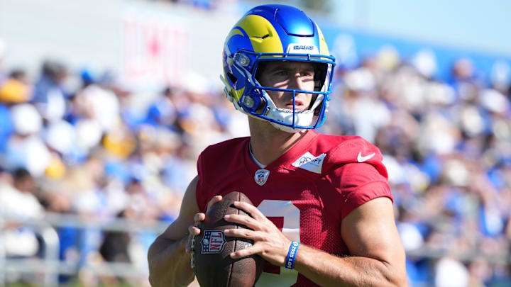 Jul 23, 2025; Los Angeles, CA, USA; Los Angeles Rams quarterback Stetson Bennett (13) throws the ball during training camp at Loyola Marymount University. Mandatory Credit: Kirby Lee-Imagn Images