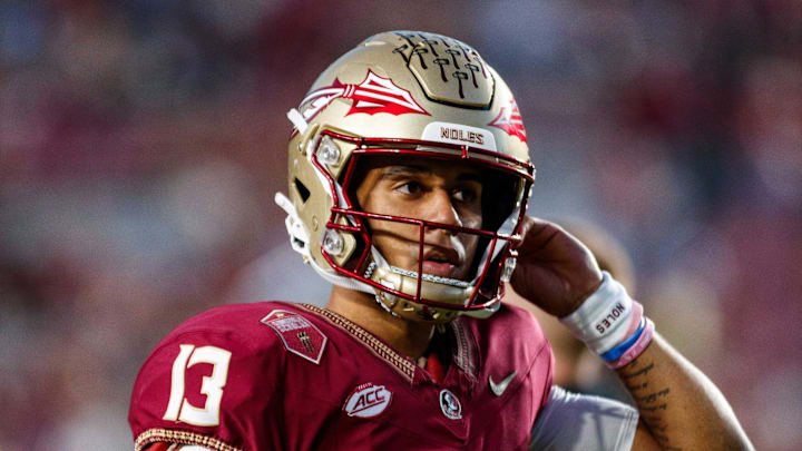 Nov 18, 2023; Tallahassee, Florida, USA; Florida State Seminoles quarterback Jordan Travis (13) during the warm ups before the game against the North Alabama Lions at Doak S. Campbell Stadium. Mandatory Credit: Morgan Tencza-Imagn Images