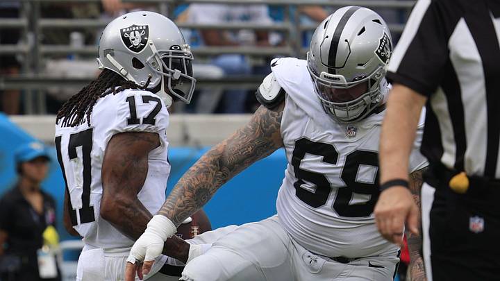 Las Vegas Raiders wide receiver Davante Adams (17) celebrates his touchdown score with teammate center Andre James (68) during the second quarter of a regular season NFL football matchup Sunday, Nov. 6, 2022 at TIAA Bank Field in Jacksonville. The Jacksonville Jaguars held off the Las Vegas Raiders 27-20. [Corey Perrine/Florida Times-Union]

Jki 110622 Raiders Jags Cp 64
