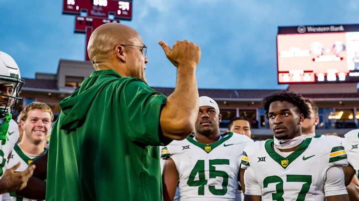 Dave Aranda speaks to his team following a win at Texas Tech in 2024. Dave Aranda speaks to his team following a win at Texas Tech in 2024.