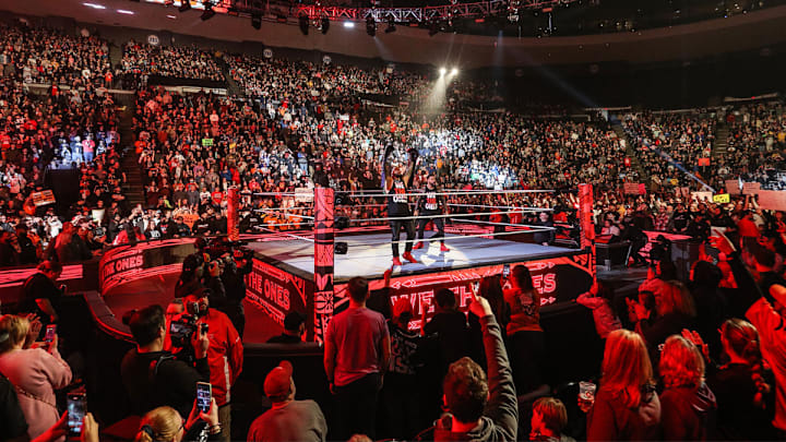 The Usos throw up the ones during an episode of WWE Monday Night Raw.
