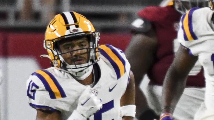 Nov 4, 2023; Tuscaloosa, Alabama, USA; Alabama Crimson Tide running back Jase McClellan (2) catches a pass and runs for a first down, pursued by LSU Tigers safety Sage Ryan (15) and LSU Tigers safety Quad Wilson (17) at Bryant-Denny Stadium. Mandatory Credit: Gary Cosby Jr.-Imagn Images Nov 4, 2023; Tuscaloosa, Alabama, USA; Alabama Crimson Tide running back Jase McClellan (2) catches a pass and runs for a first down, pursued by LSU Tigers safety Sage Ryan (15) and LSU Tigers safety Quad Wilson (17) at Bryant-Denny Stadium. Mandatory Credit: Gary Cosby Jr.-Imagn Images