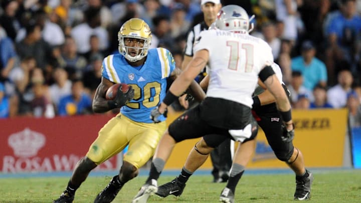 September 10, 2016; Pasadena, CA, USA; UCLA Bruins running back Brandon Stephens (20) runs the ball against the UNLV Rebels during the second half at Rose Bowl. Mandatory Credit: Gary A. Vasquez-Imagn Images September 10, 2016; Pasadena, CA, USA; UCLA Bruins running back Brandon Stephens (20) runs the ball against the UNLV Rebels during the second half at Rose Bowl. Mandatory Credit: Gary A. Vasquez-Imagn Images
