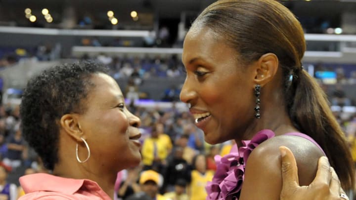 Aug 9, 2010; Los Angeles, CA, USA; Los Angeles Sparks coach Jennifer Gillom (left) congratulates former player Lisa Leslie (right) after her No. 9 jersey was retired at halftime of the WNBA game against the Indian Fever at the Staples Center. Mandatory Credit: Kirby Lee/Image of Sport-Imagn Images Aug 9, 2010; Los Angeles, CA, USA; Los Angeles Sparks coach Jennifer Gillom (left) congratulates former player Lisa Leslie (right) after her No. 9 jersey was retired at halftime of the WNBA game against the Indian Fever at the Staples Center. Mandatory Credit: Kirby Lee/Image of Sport-Imagn Images