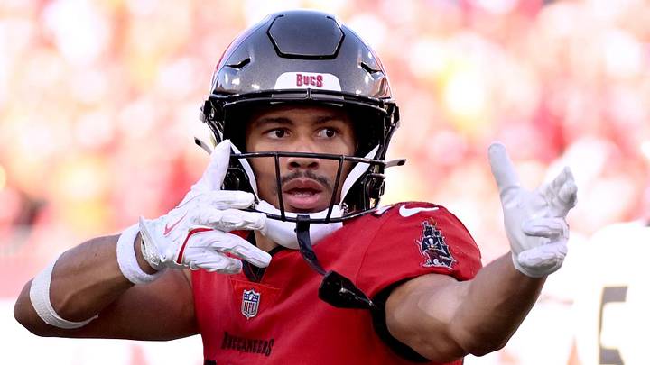 Jan 5, 2025; Tampa, Florida, USA;  Tampa Bay Buccaneers wide receiver Jalen McMillan (15) celebrates after catching a pass in the second half  against the New Orleans Saints at Raymond James Stadium. Mandatory Credit: Jonathan Dyer-Imagn Images
