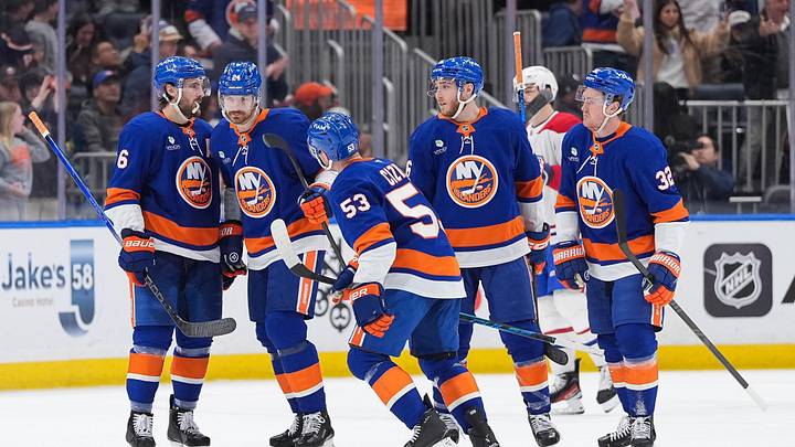 Apr 12, 2026; Elmont, New York, USA; New York Islanders center Casey Cizikas (53) celebrates a goal with defenseman Ryan Pulock (6), defenseman Scott Mayfield (24), center Marc Gatcomb (16) and center Kyle MacLean (32) against the Montreal Canadiens in the third period at UBS Arena. Mandatory Credit: Alexander Wohl-Imagn Images