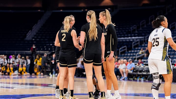 Wake Forest Women's Basketball team huddles against the California Golden Bears in the ACC Tournament.