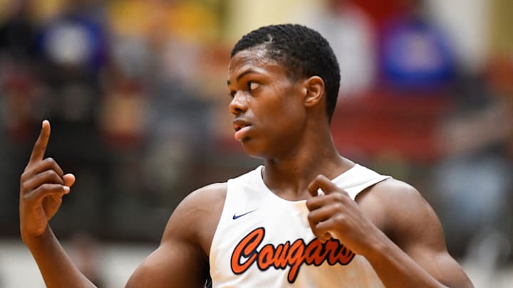 Gary West Side High Cougars Quimari Peterson (1) celebrates after scoring in 2021.