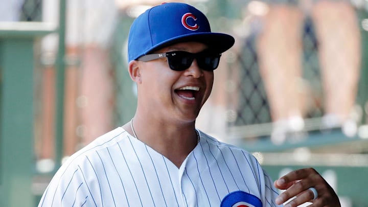Aug 4, 2019; Chicago, IL, USA; Chicago Cubs first base coach Will Venable (25) gestures while talking in the dugout before the game against the Milwaukee Brewers at Wrigley Field. The Chicago Cubs won 7-2
