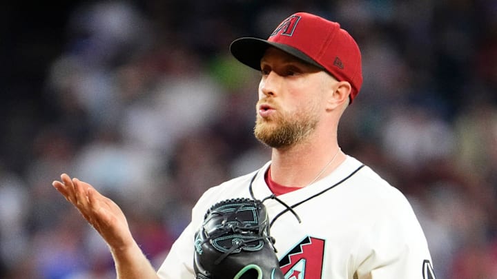 Arizona Diamondbacks starting pitcher Merrill Kelly reacts against the Chicago Cubs in the first inning at Chase Field in Phoenix, on March 28, 2025.