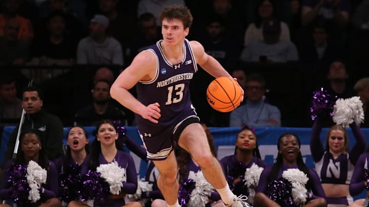 March 22, 2024, Brooklyn, NY, USA; Northwestern Wildcats guard Brooks Barnhizer (13) controls the ball against the Florida Atlantic Owls in the first round of the 2024 NCAA Tournament at the Barclays Center. Mandatory Credit: Brad Penner-Imagn Images
