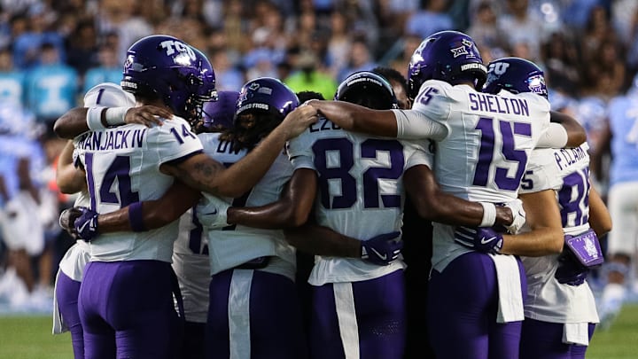 TCU wide receivers gather before kickoff against the UNC Tar Heels in Chapel Hill, North Carolina.