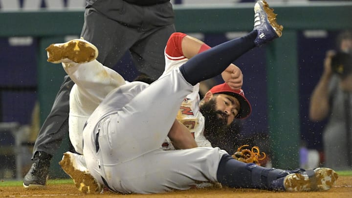 May 29, 2024; Anaheim, California, USA; New York Yankees shortstop Anthony Volpe (11) collides with Los Angeles Angels third baseman Luis Guillorme (15) on a triple and then scored on a throwing error by Los Angeles Angels second baseman Luis Rengifo (2) in the seventh inning at Angel Stadium. Mandatory Credit: Jayne Kamin-Oncea-USA TODAY Sports