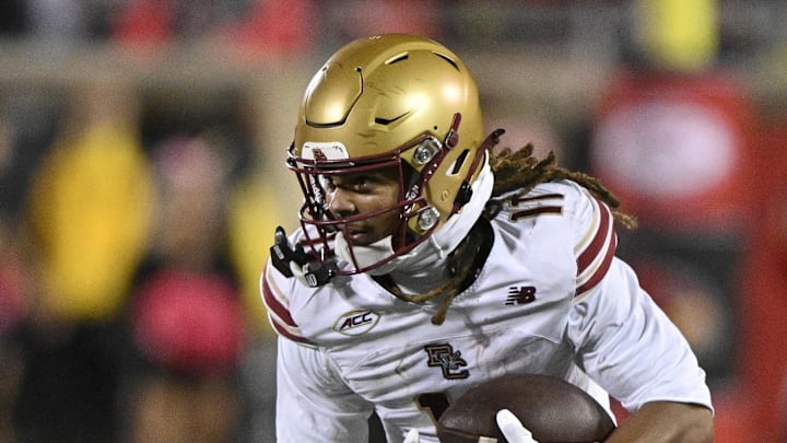 Oct 25, 2025; Louisville, Kentucky, USA;  Boston College Eagles wide receiver Lewis Bond (11) runs the ball against the Louisville Cardinals during the first half at L&N Federal Credit Union Stadium. Louisville defeated Boston College 38-24. Mandatory Credit: Jamie Rhodes-Imagn Images