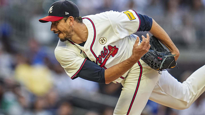 Sep 15, 2024; Cumberland, Georgia, USA; Atlanta Braves starting pitcher Charlie Morton (50) pitches against the Los Angeles Dodgers during the first inning at Truist Park. Mandatory Credit: Dale Zanine-Imagn Images