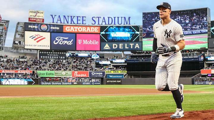 Apr 16, 2025; Bronx, New York, USA;  New York Yankees designated hitter Aaron Judge (99) runs into the dugout prior to the start of the game against the Kansas City Royals at Yankee Stadium. Mandatory Credit: Wendell Cruz-Imagn Images