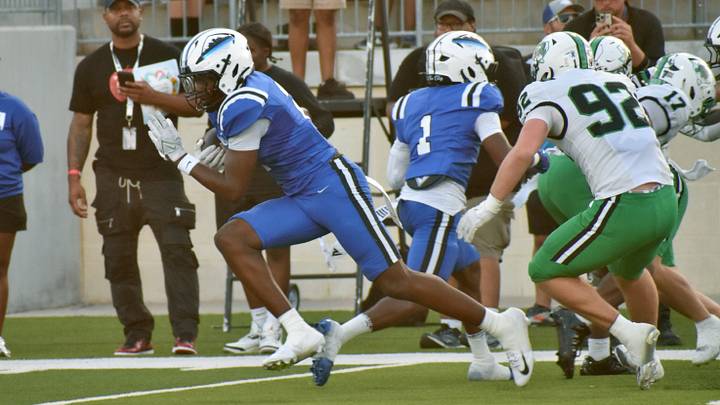 North Crowley's Damarion Mays runs away from Southlake Carroll defenders in a Week 2 win. North Crowley's Damarion Mays runs away from Southlake Carroll defenders in a Week 2 win.
