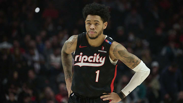 Jan 11, 2025; Portland, Oregon, USA; Portland Trail Blazers guard Anfernee Simons (1) waits for the ball during a break in the game during the first half against the Miami Heat at Moda Center. Mandatory Credit: Troy Wayrynen-Imagn Images