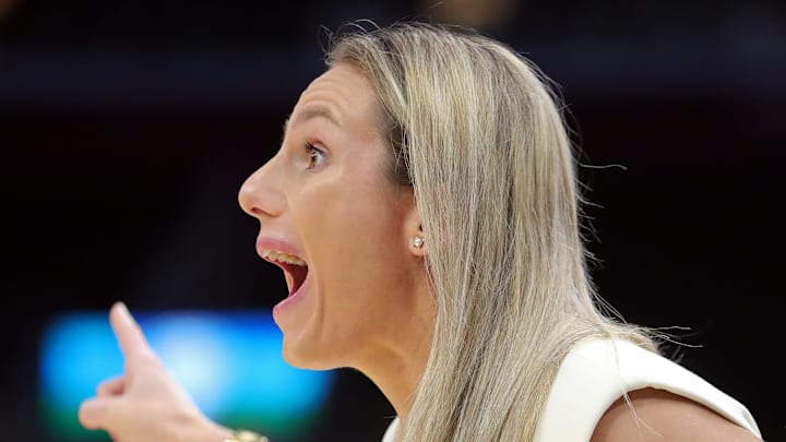 Buffalo Bulls head coach Becky Burke works the sideline during the first half of the Mid-American Conference Tournament women's championship game at Rocket Mortgage FieldHouse, Saturday, March 16, 2024, in Cleveland, Ohio.