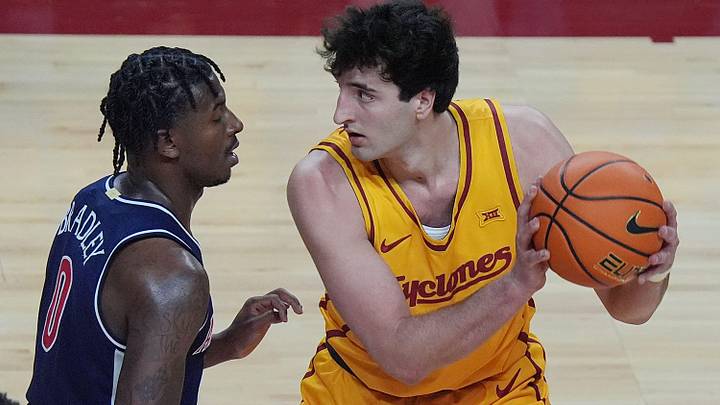 Iowa State Cyclones forward Milan Momcilovic (22) looks for drive around Arizona Wildcats guard Jaden Bradley (0) during the second half in the Big-12 men’s basketball showdown at Hilton Coliseum on Saturday March 1, 2025 in Ames, Iowa. Iowa State Cyclones forward Milan Momcilovic (22) looks for drive around Arizona Wildcats guard Jaden Bradley (0) during the second half in the Big-12 men’s basketball showdown at Hilton Coliseum on Saturday March 1, 2025 in Ames, Iowa.