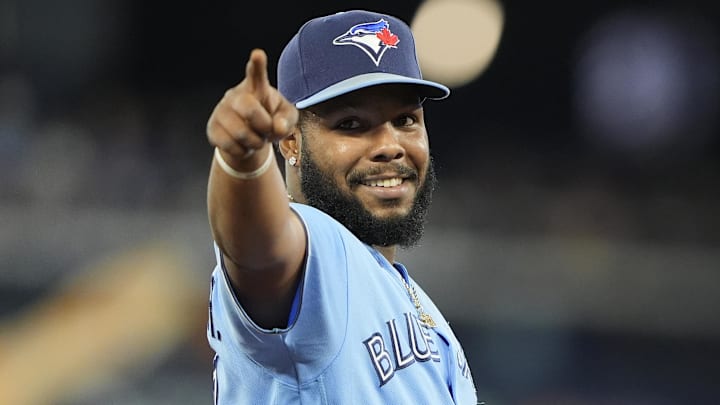 Toronto Blue Jays first baseman Vladimir Guerrero Jr. (27) gestures to a fan. 