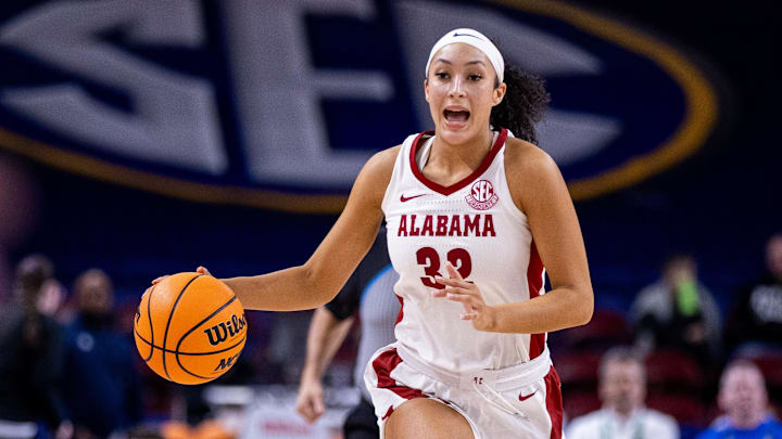 Mar 6, 2025; Greenville, SC, USA; Alabama Crimson Tide guard Aaliyah Nye (32) brings the ball up court during the second half against the Florida Gators at Bon Secours Wellness Arena. Mandatory Credit: Scott Kinser-Imagn Images