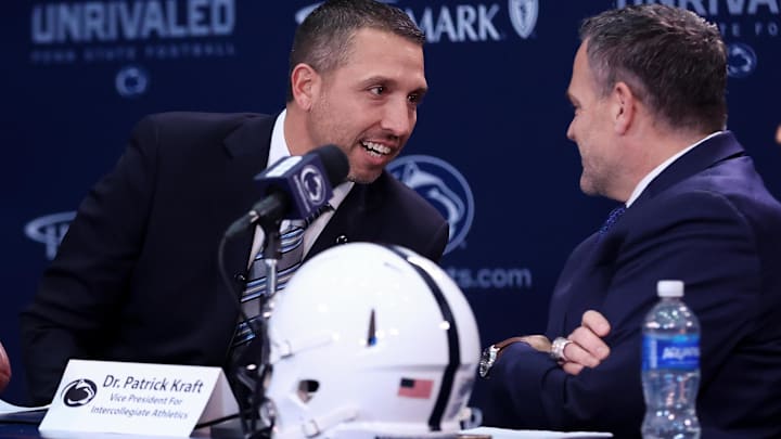 Matt Campbell, left, speaks with Penn State University athletic director Pat Kraft while being announced as the Penn State Nittany Lions new head coach during a press conference at Beaver Stadium. Matt Campbell, left, speaks with Penn State University athletic director Pat Kraft while being announced as the Penn State Nittany Lions new head coach during a press conference at Beaver Stadium.