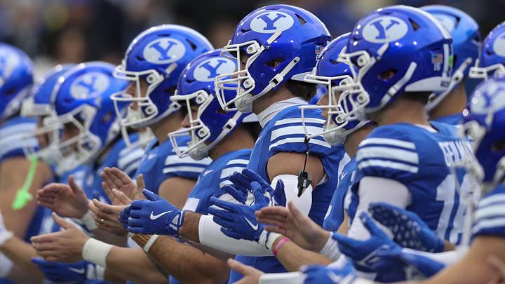 Nov 29, 2025; Provo, Utah, USA; The BYU Cougars warm up before the game against the UCF Knights at LaVell Edwards Stadium. Mandatory Credit: Rob Gray-Imagn Images