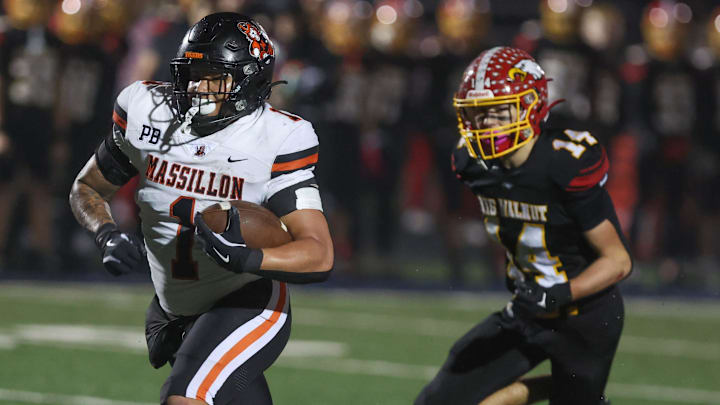 Massillon's Savior Owens runs the ball against Sunbury Big Walnut in an OHSAA Division II regional final, Friday, Nov. 21, 2025, in Zanesville.