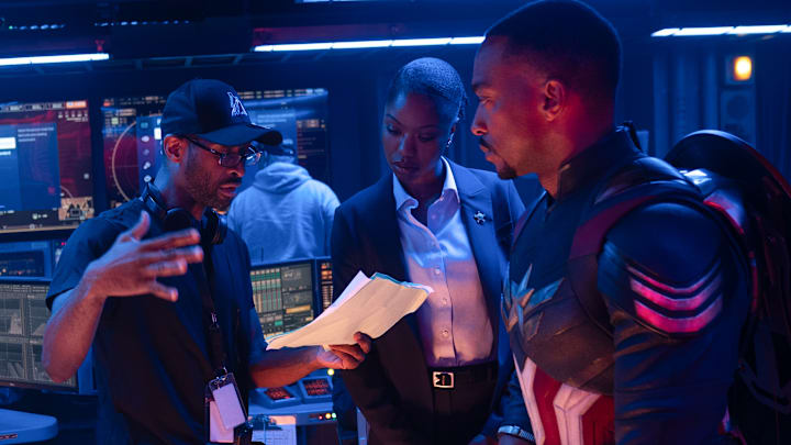 (L-R): Director Julius Onah, Xosha Roquemore, and Anthony Mackie behind the scenes of Marvel Studios' CAPTAIN AMERICA: BRAVE NEW WORLD. Photo by Eli Adé. © 2024 MARVEL.