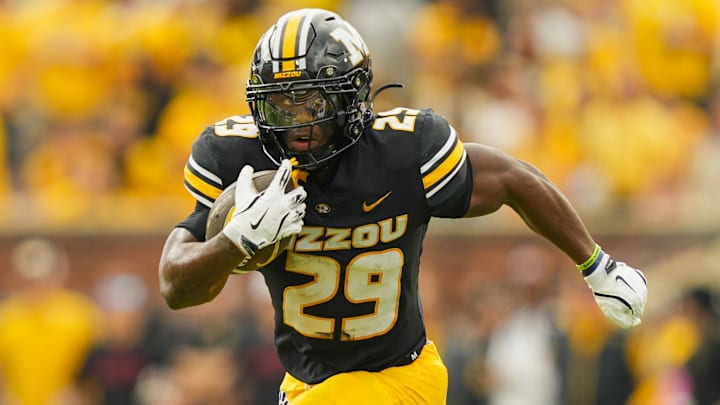 Missouri Tigers running back Ahmad Hardy (29) runs the ball during the first half against the Alabama Crimson Tide at Faurot Field at Memorial Stadium. Missouri Tigers running back Ahmad Hardy (29) runs the ball during the first half against the Alabama Crimson Tide at Faurot Field at Memorial Stadium.