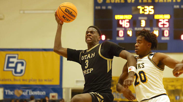 Utah Prep's AJ Dybantsa drives to the basket past Highland School defender Chance Perkins during a game at Emmanuel College in Boston on Tuesday, Nov. 5, 2024.