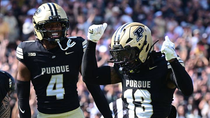 Purdue Boilermakers defensive backs Hudauri Hines (4) and John Slaughter (13).