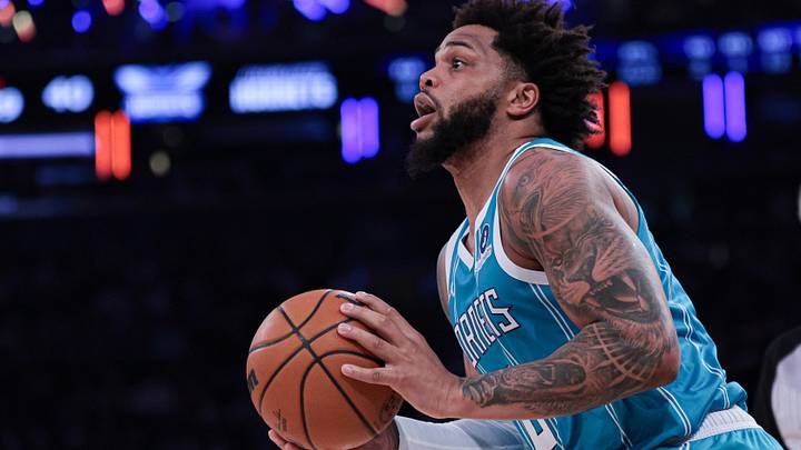 Apr 12, 2026; New York, New York, USA; Charlotte Hornets forward Miles Bridges (0) shoots the ball against the New York Knicks during the first half at Madison Square Garden. Mandatory Credit: Vincent Carchietta-Imagn Images