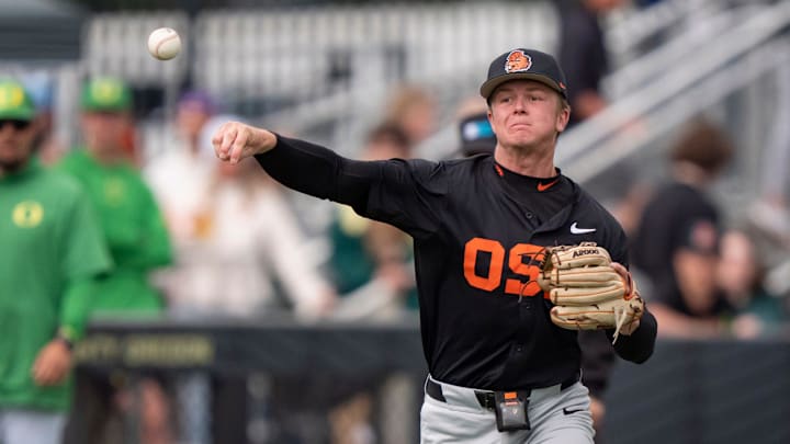 Oregon State infielder Trent Caraway throws to first for an out as the Oregon Ducks host the Oregon State Beavers on April 25, 2025, at PK Park in Eugene.
