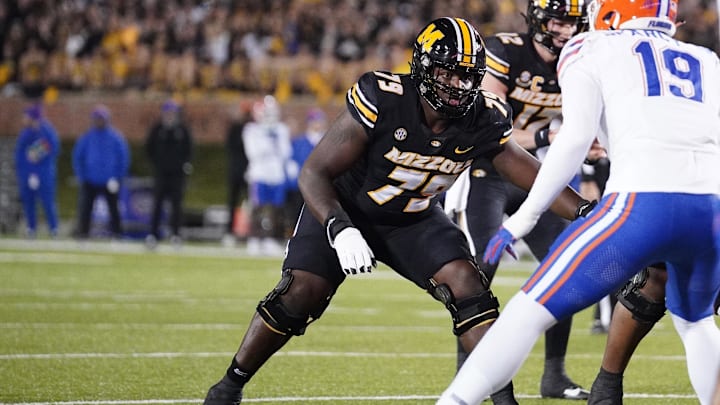Nov 18, 2023; Columbia, Missouri, USA; Missouri Tigers offensive lineman Armand Membou (79) at the line of scrimmage against the Florida Gators during the game at Faurot Field at Memorial Stadium. 