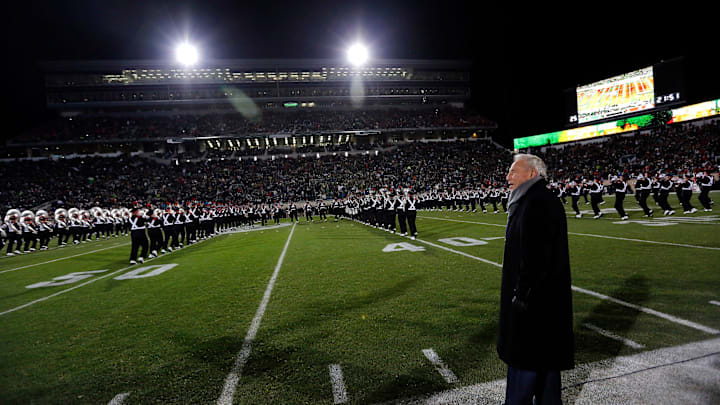 ESPN College GameDay analyst Lee Corso watches the Ohio State Marching Band prior to the Buckeyes' 49-37 win over Michigan State in the NCAA football game at Spartan Stadium in East Lansing, Michigan on Nov. 8, 2014.