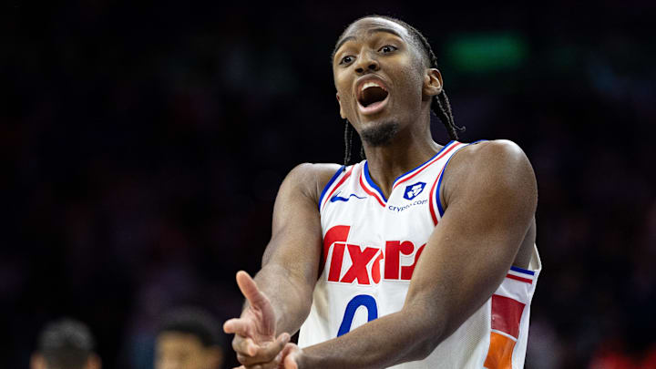 Dec 23, 2024; Philadelphia, Pennsylvania, USA; Philadelphia 76ers guard Tyrese Maxey (0) reacts to his three pointer in the closing moments of the game against the San Antonio Spurs at Wells Fargo Center. Mandatory Credit: Bill Streicher-Imagn Images