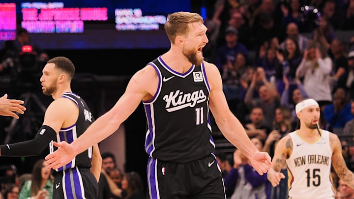 Feb 8, 2025; Sacramento, California, USA; Sacramento Kings center Domantas Sabonis (11) celebrates with teammates after a play against the New Orleans Pelicans during the fourth quarter at Golden 1 Center. Mandatory Credit: Kelley L Cox-Imagn Images