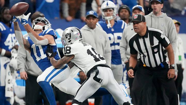 Indianapolis Colts wide receiver Michael Pittman Jr. (11) reaches for the ball as Las Vegas Raiders