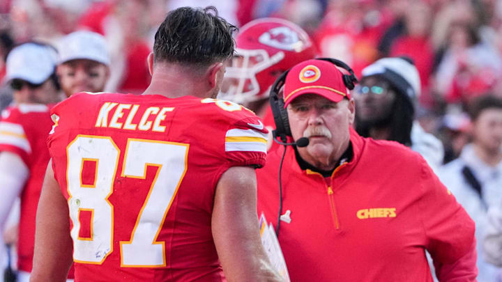 Nov 10, 2024; Kansas City, Missouri, USA; Kansas City Chiefs tight end Travis Kelce (87) talks with head coach Andy Reid against the Denver Broncos during the second half at GEHA Field at Arrowhead Stadium. Mandatory Credit: Denny Medley-Imagn Images