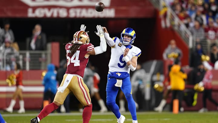 Dec 12, 2024; Santa Clara, California, USA; Los Angeles Rams quarterback Matthew Stafford (9) throws a pass over San Francisco 49ers linebacker Fred Warner (54) in the third quarter at Levi's Stadium. Mandatory Credit: Cary Edmondson-Imagn Images Dec 12, 2024; Santa Clara, California, USA; Los Angeles Rams quarterback Matthew Stafford (9) throws a pass over San Francisco 49ers linebacker Fred Warner (54) in the third quarter at Levi's Stadium. Mandatory Credit: Cary Edmondson-Imagn Images