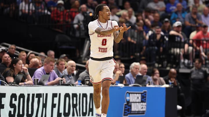 Mar 20, 2026; Tampa, FL, USA; Alabama Crimson Tide guard Labaron Philon (0) reacts after a basket in the second half against the Hofstra Pride during a first round game of the men's 2026 NCAA Tournament at Benchmark International Arena. Mandatory Credit: Nathan Ray Seebeck-Imagn Images