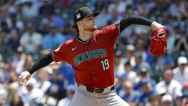 Jul 19, 2024; Chicago, Illinois, USA; Arizona Diamondbacks starting pitcher Ryne Nelson (19) delivers a pitch against the Chicago Cubs during the first inning at Wrigley Field. Mandatory Credit: Kamil Krzaczynski-USA TODAY Sports Jul 19, 2024; Chicago, Illinois, USA; Arizona Diamondbacks starting pitcher Ryne Nelson (19) delivers a pitch against the Chicago Cubs during the first inning at Wrigley Field. Mandatory Credit: Kamil Krzaczynski-USA TODAY Sports