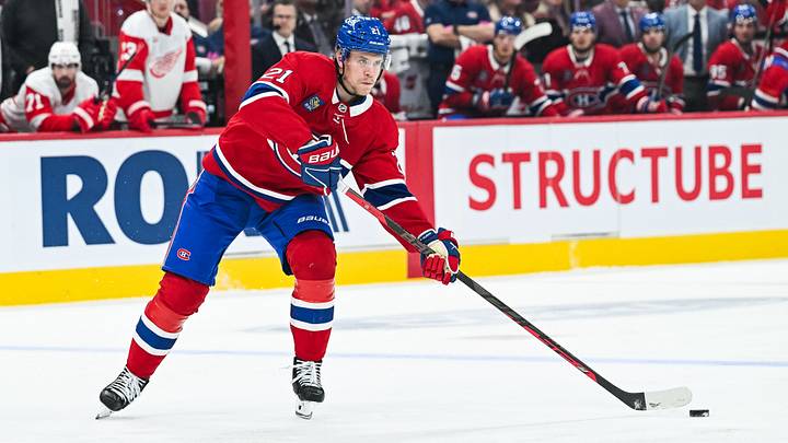 Oct 10, 2026; Montreal, Quebec, CAN; Montreal Canadiens defenseman Kaiden Guhle (21) passes the puck against the Detroit Red Wings during the first period at Bell Centre. Mandatory Credit: David Kirouac-Imagn Images Oct 10, 2026; Montreal, Quebec, CAN; Montreal Canadiens defenseman Kaiden Guhle (21) passes the puck against the Detroit Red Wings during the first period at Bell Centre. Mandatory Credit: David Kirouac-Imagn Images