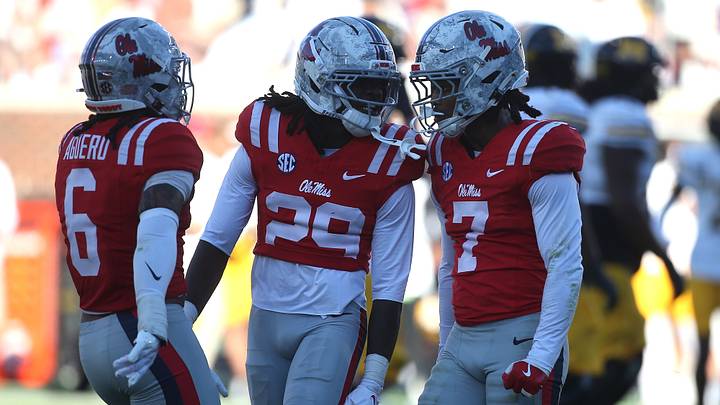 Mississippi Rebels safety Joenel Aguero celebrates with safety Nick Cull and safety Sharif Denson after a defensive stop during the second half at Vaught-Hemingway Stadium. Mandatory Credit: Petre Thomas-Imagn Images Mississippi Rebels safety Joenel Aguero celebrates with safety Nick Cull and safety Sharif Denson after a defensive stop during the second half at Vaught-Hemingway Stadium. Mandatory Credit: Petre Thomas-Imagn Images