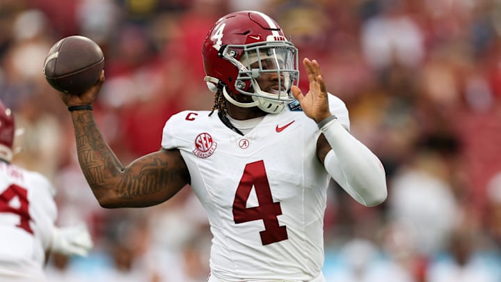 Dec 31, 2024; Tampa, FL, USA; Alabama Crimson Tide quarterback Jalen Milroe (4) drops back to pass against the Michigan Wolverines in the first quarter during the ReliaQuest Bowl at Raymond James Stadium. Mandatory Credit: Nathan Ray Seebeck-Imagn Images Dec 31, 2024; Tampa, FL, USA; Alabama Crimson Tide quarterback Jalen Milroe (4) drops back to pass against the Michigan Wolverines in the first quarter during the ReliaQuest Bowl at Raymond James Stadium. Mandatory Credit: Nathan Ray Seebeck-Imagn Images
