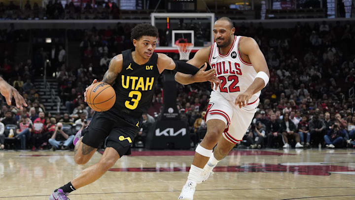 Nov 4, 2024; Chicago, Illinois, USA; Chicago Bulls forward Talen Horton-Tucker (22) defends Utah Jazz guard Keyonte George (3) during the first quarter at United Center. Mandatory Credit: David Banks-Imagn Images