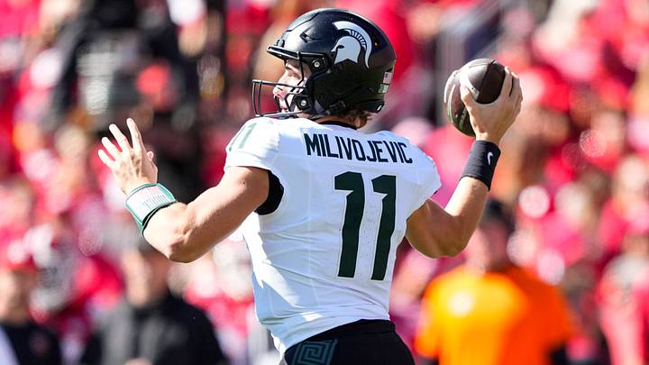 Oct 3, 2026; Madison, Wisconsin, USA; Michigan State Spartans quarterback Alessio Milivojevic (11) throws a pass during the second quarter against the Wisconsin Badgers at Camp Randall Stadium. Mandatory Credit: Jeff Hanisch-Imagn Images Oct 3, 2026; Madison, Wisconsin, USA; Michigan State Spartans quarterback Alessio Milivojevic (11) throws a pass during the second quarter against the Wisconsin Badgers at Camp Randall Stadium. Mandatory Credit: Jeff Hanisch-Imagn Images